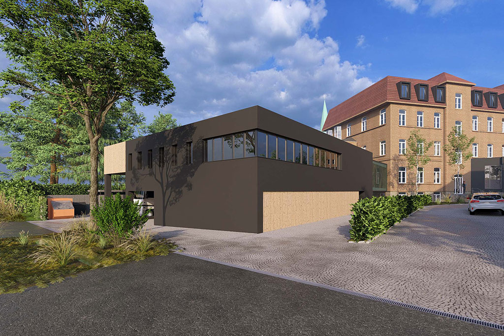 In einem schwarzen und sandfarben Flachbau wird die neue Zentralküche der Franziskanerinnen mit einer Kapazität für 500 Essen eingerichtet. Visualisierung: © Wellie Architekten Partner / Arnsberg